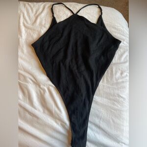 Worn once black Wild Fable bodysuit. High cut and low back. Adjustable straps. L